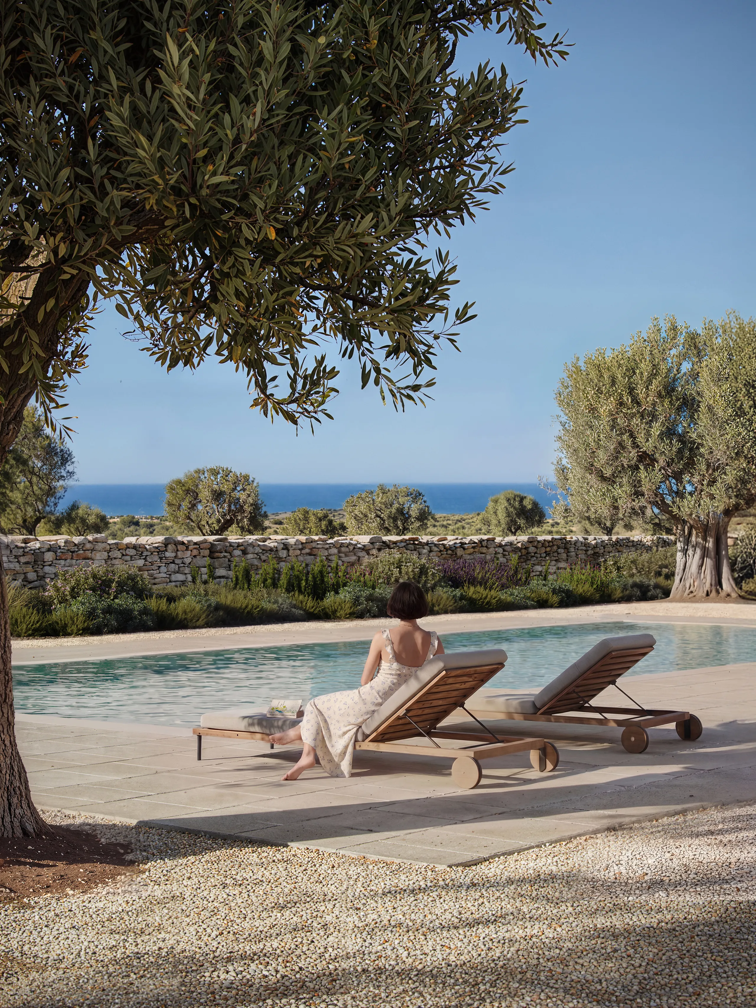 Lamalunga Villa, a contemporary residence with a private pool surrounded by the landscapes of Italy's Itria Valley.